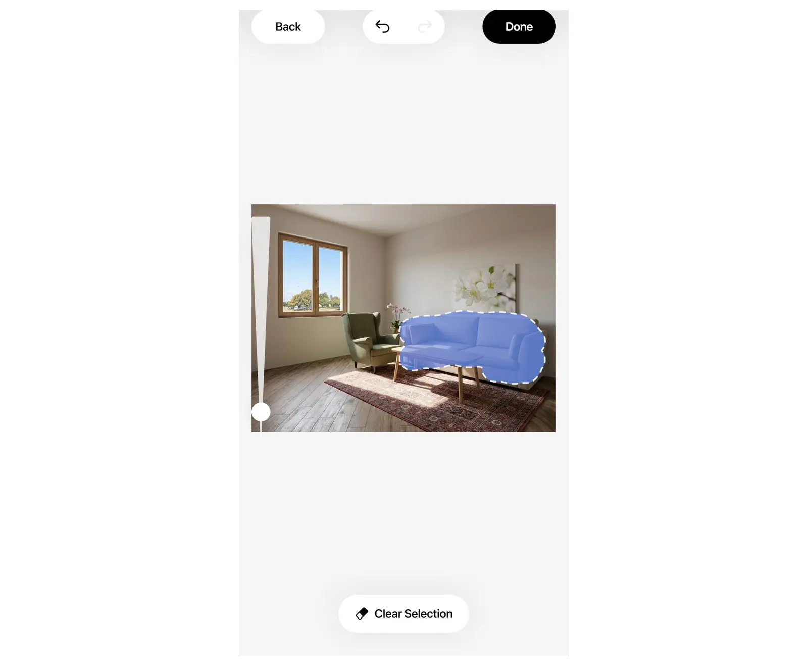 Pincel de área en Rediseño IA de Home Planner: un sofá seleccionado con el pincel y el botón Hecho en la parte superior