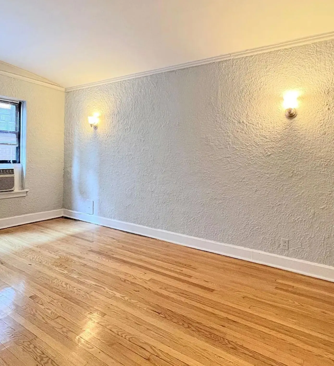 An empty living room in a listing photo