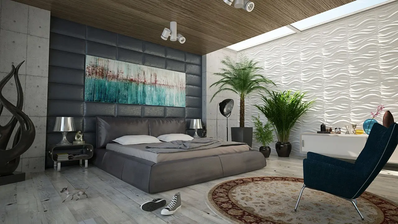 Modern bedroom with a wooden plank ceiling, spotlights and a white wave-pattern wall