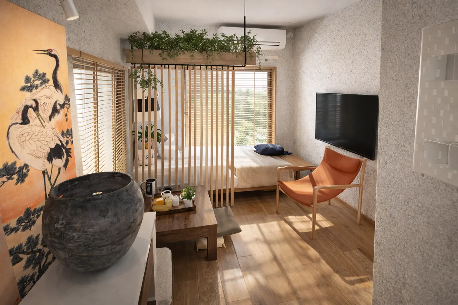 Estudio pequeño con un divisor de listones de madera entre la cama y la sala de estar
