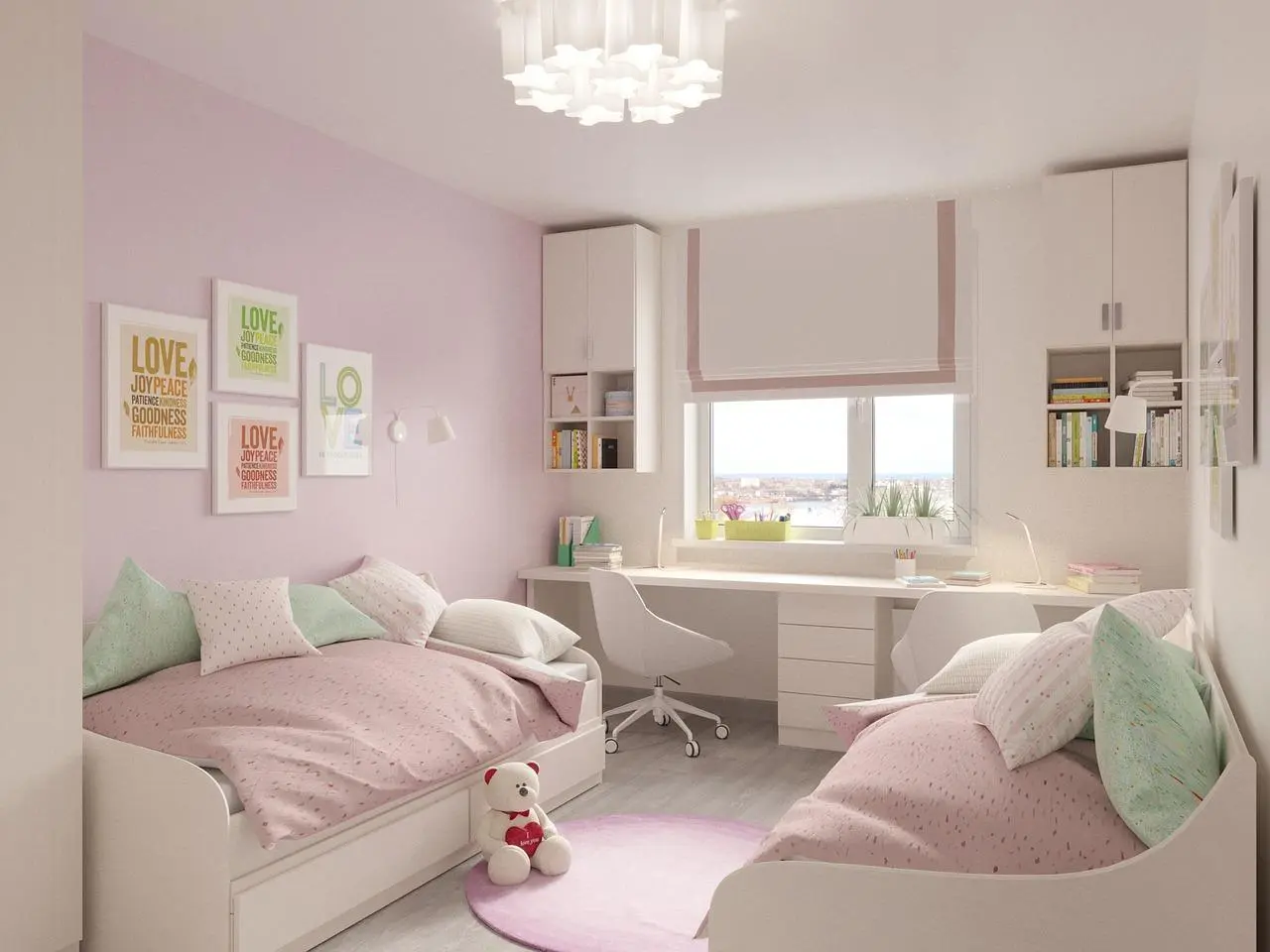 Pink girls' room with two daybeds, a white desk under the window and wall shelves